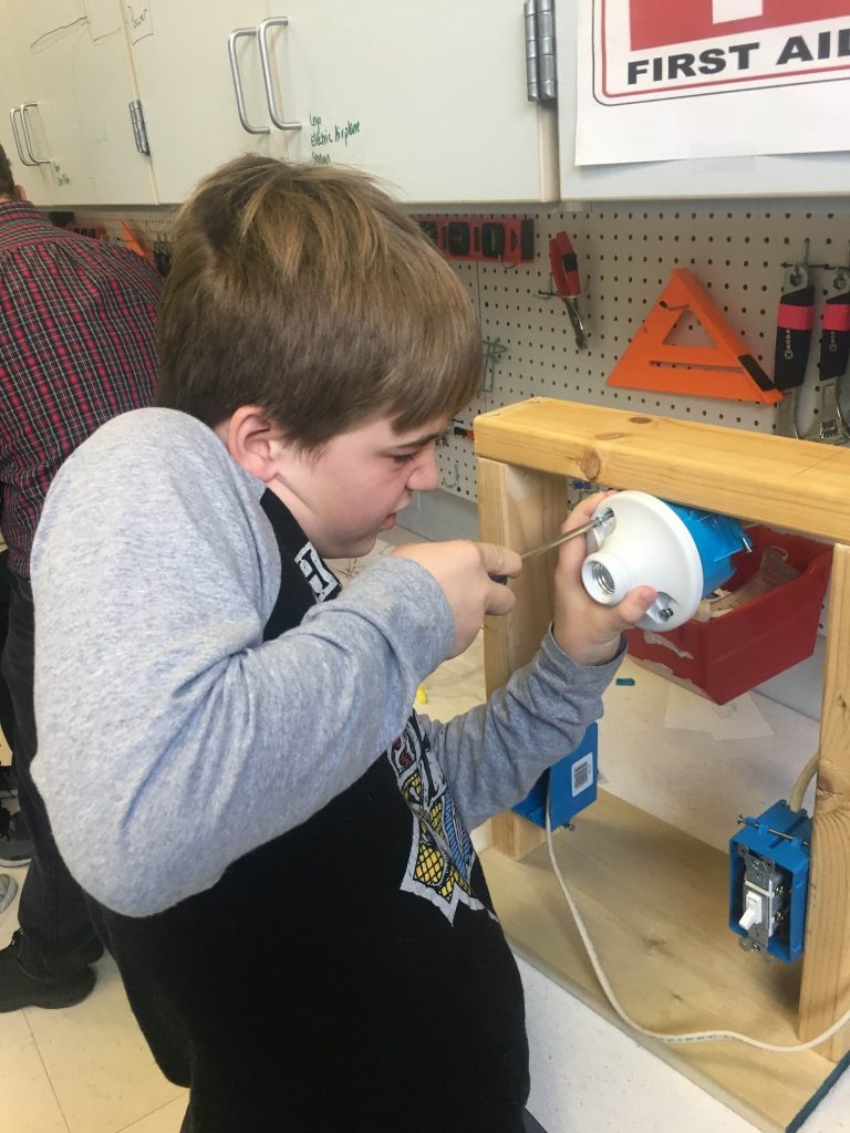 Members of the KHO teach shop classes at Roosevelt 2019